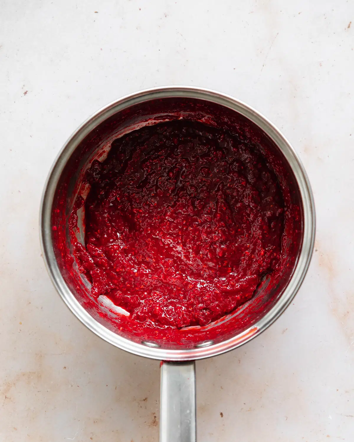 berry jam in a saucepan.
