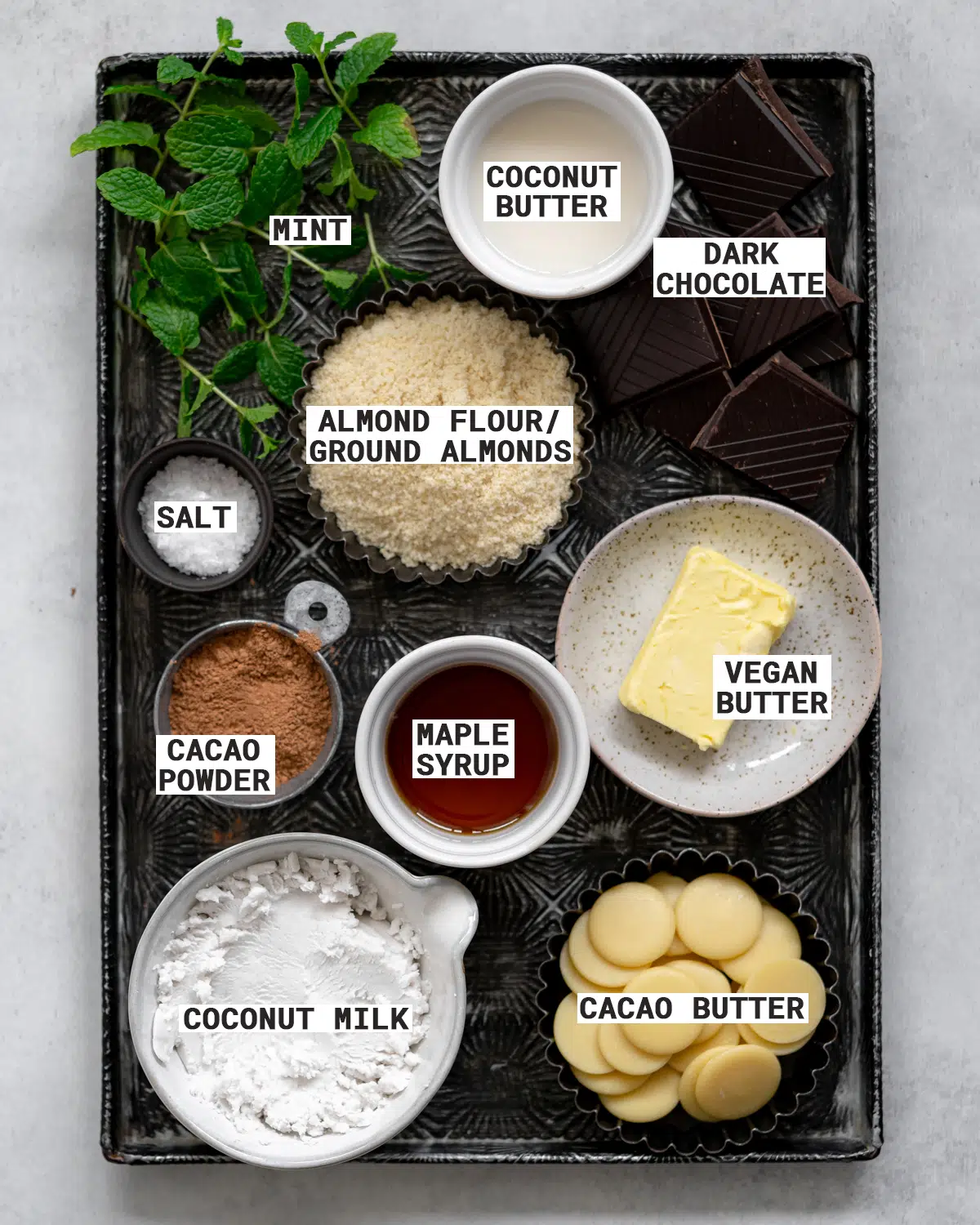 ingredients for mint chocolate slice on a metal tray.