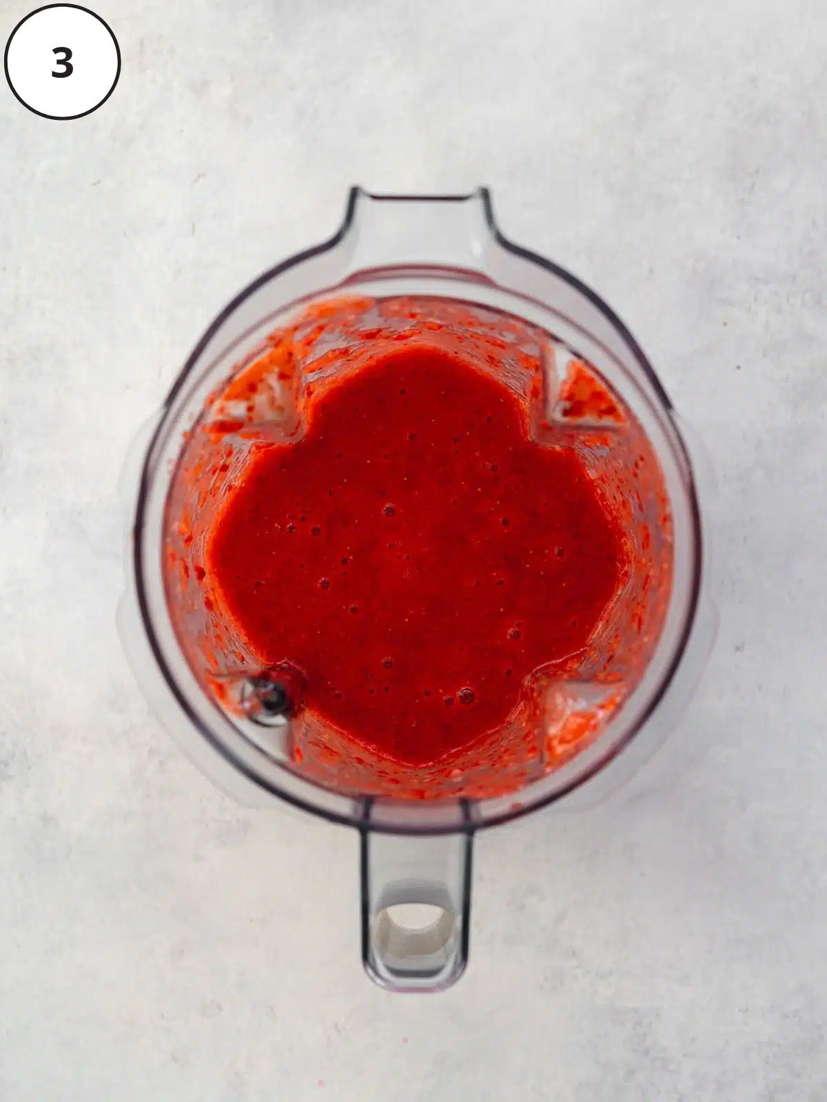 strawberry puree blended until smooth in a blender jug.