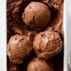closeup of creamy no churn chocolate ice cream scoops.