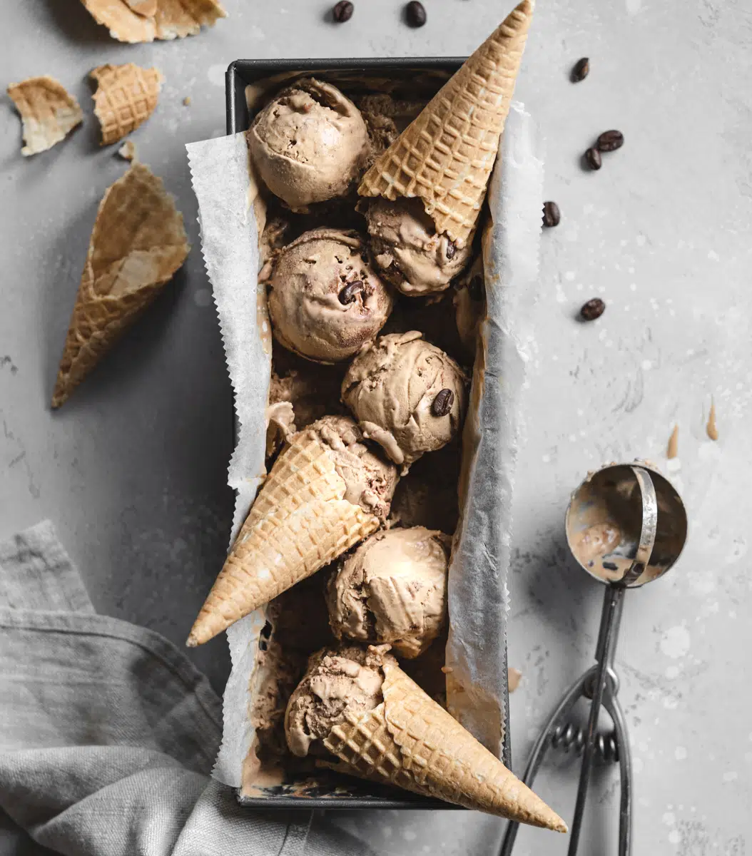 flat lay of coffee ice cream with cones.