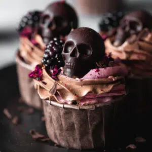 halloween skull chocolate cupcakes with blackberry filling.