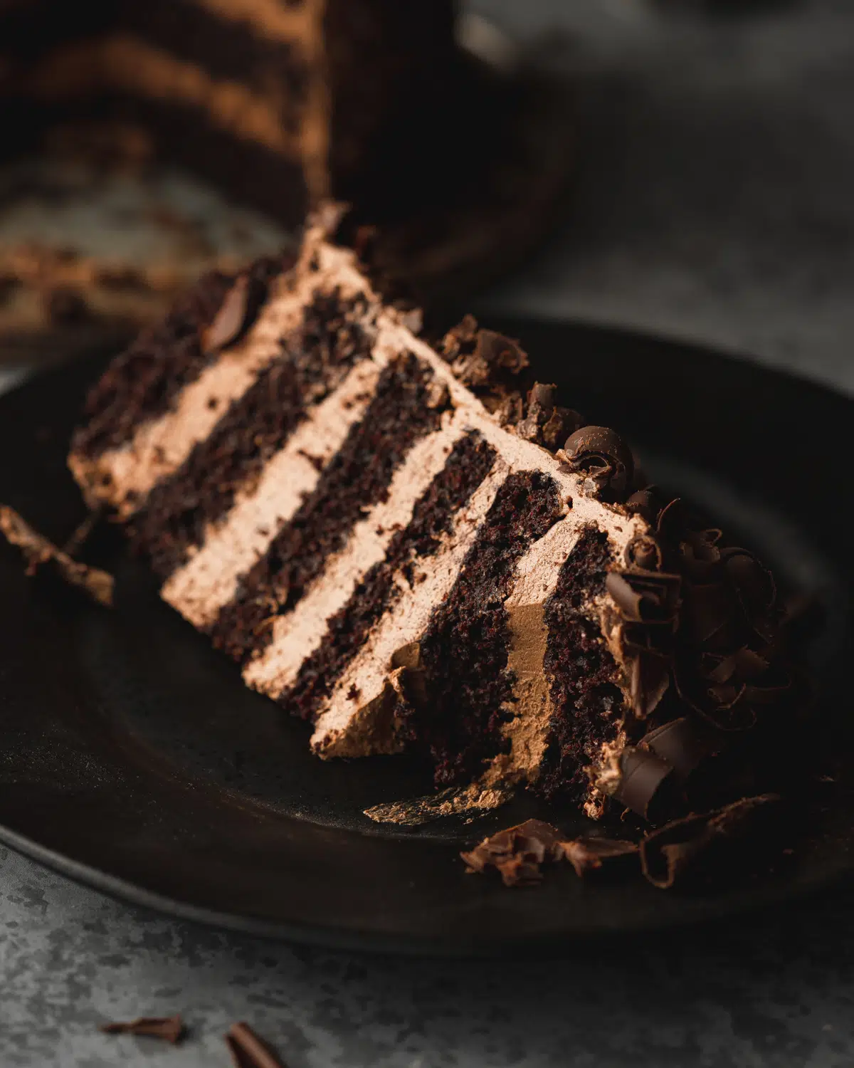 slice of vegan layered chocolate cake.
