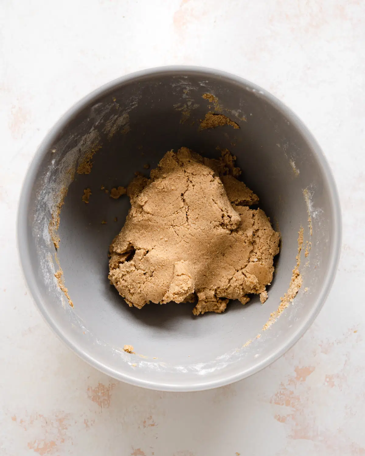 speculoos cookie dough in a grey bowl.