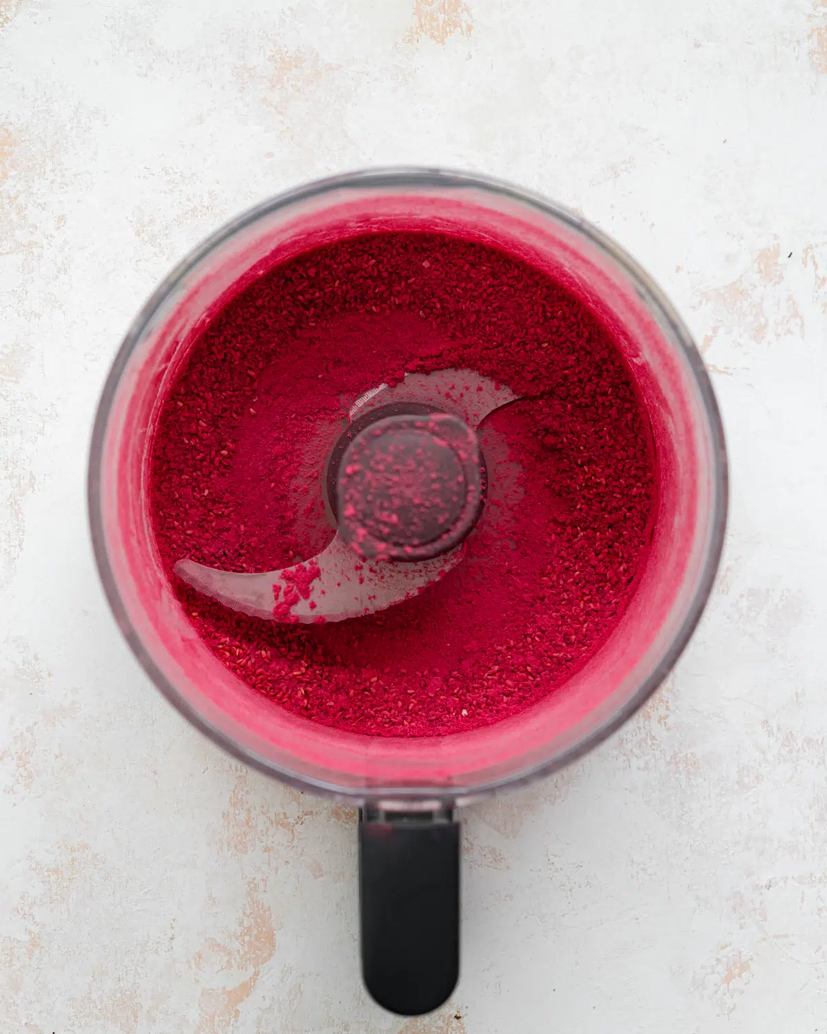 raspberry powder in a food processor.