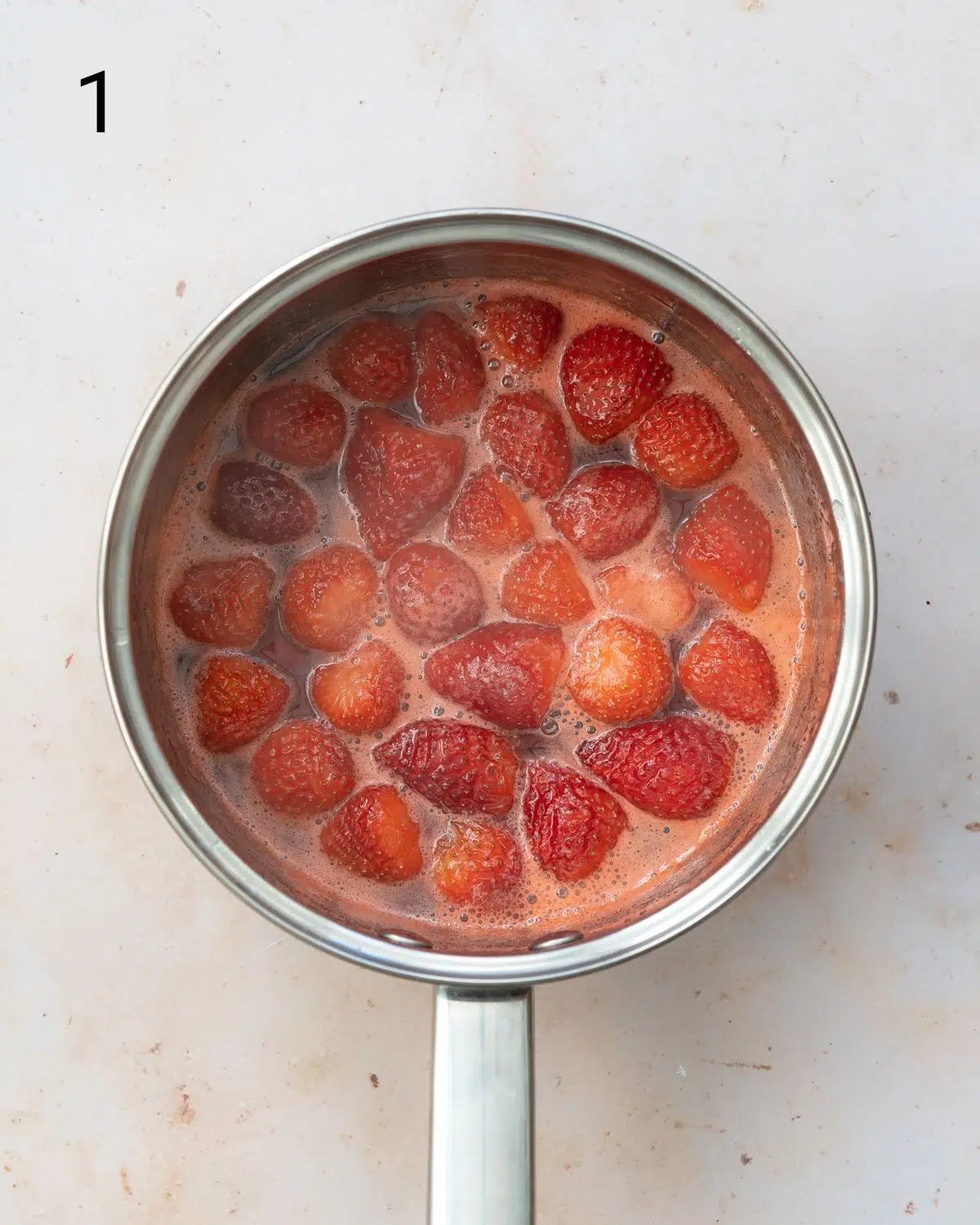 strawberry confit in a saucepan.