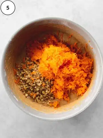 carrot cake ingredients in a bowl.