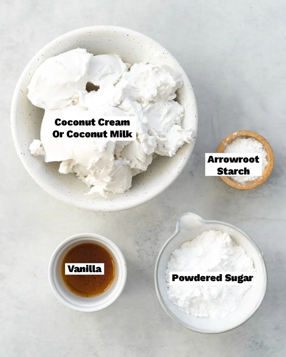 top down view of ingredients for coconut whipped cream measured out in bowls.