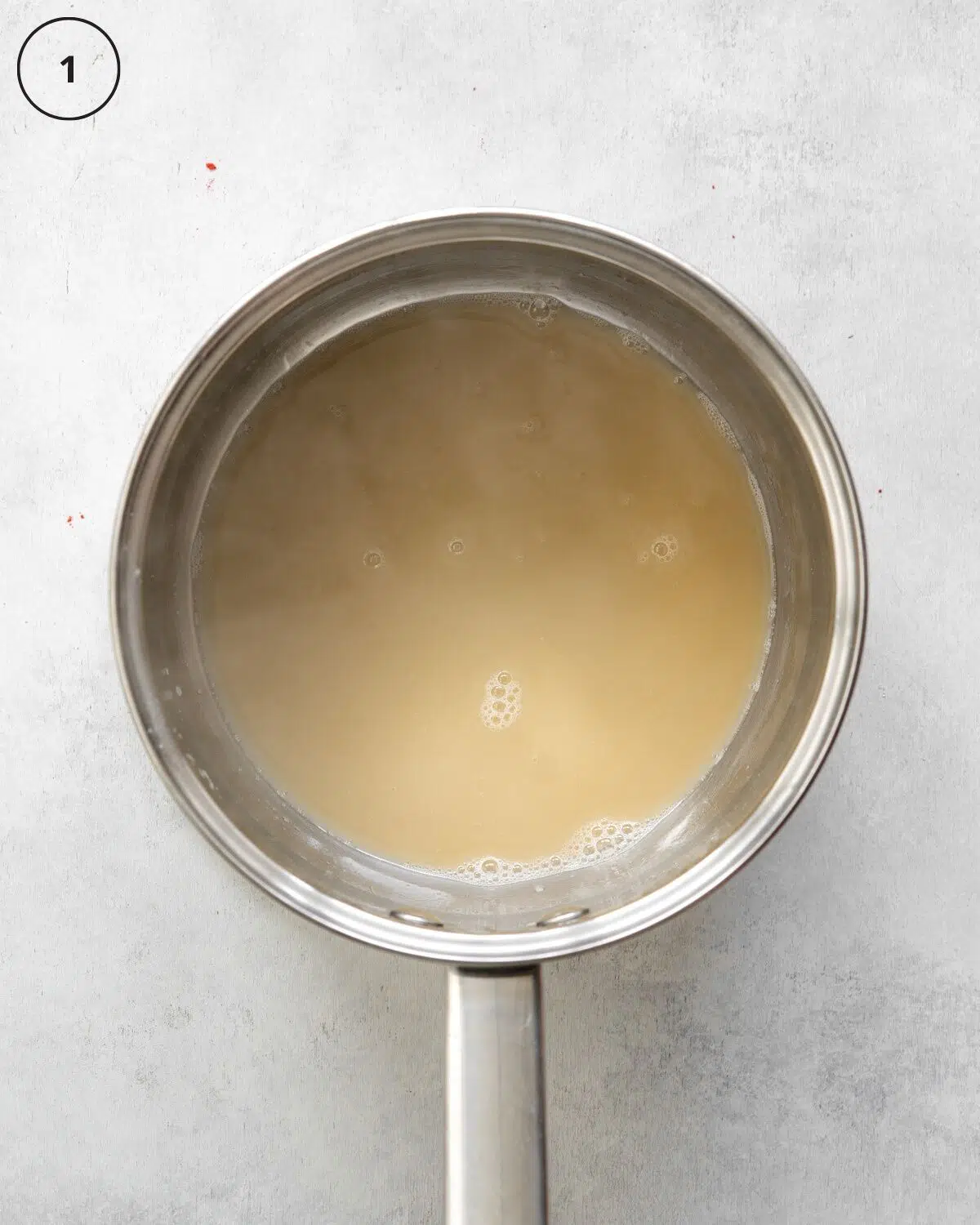 saucepan with reduced aquafaba.