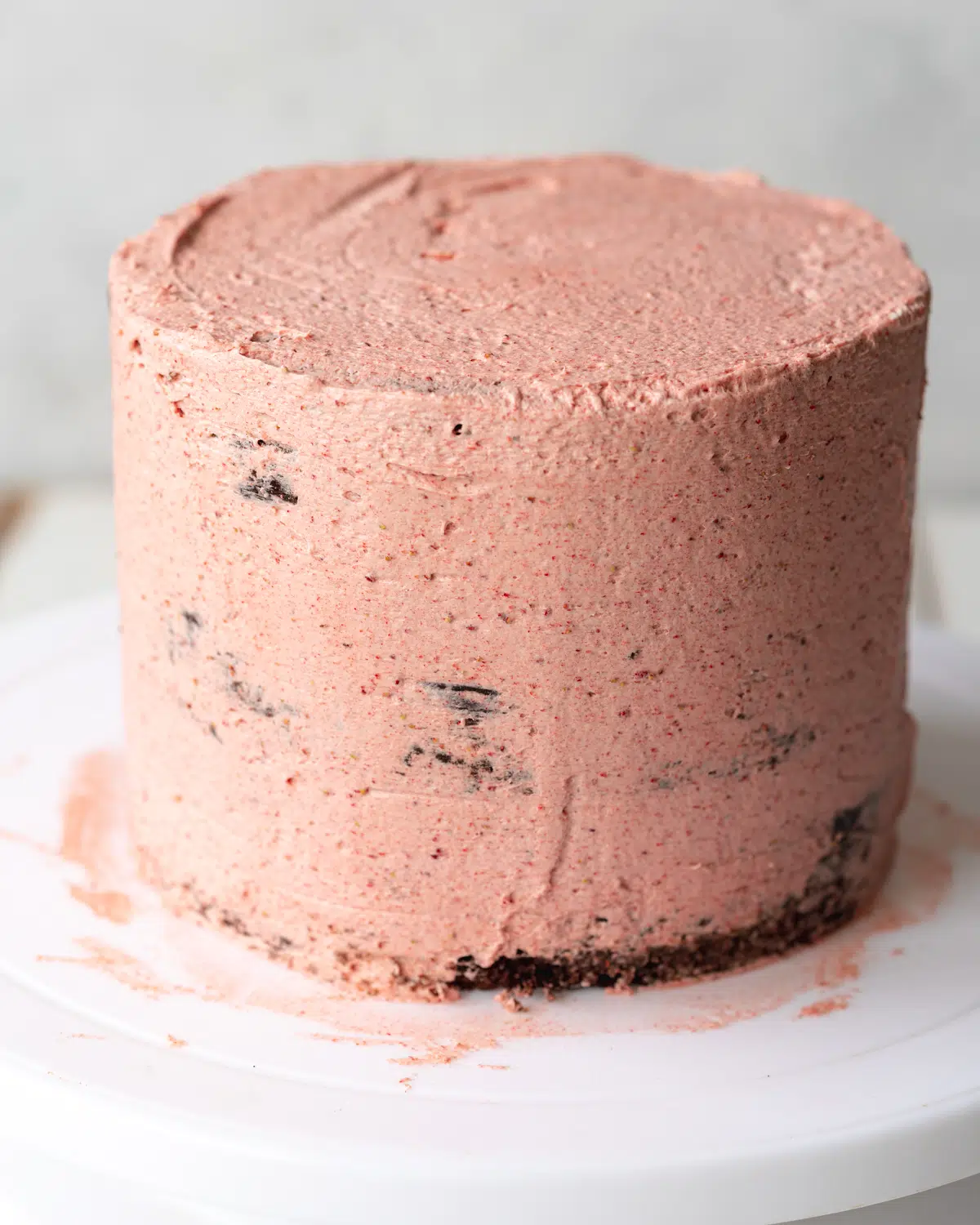 cake frosted with strawberry buttercream.