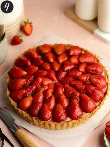 a glazed French strawberry tart before serving.