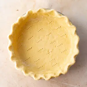 pie crust in a clear pastry dish.