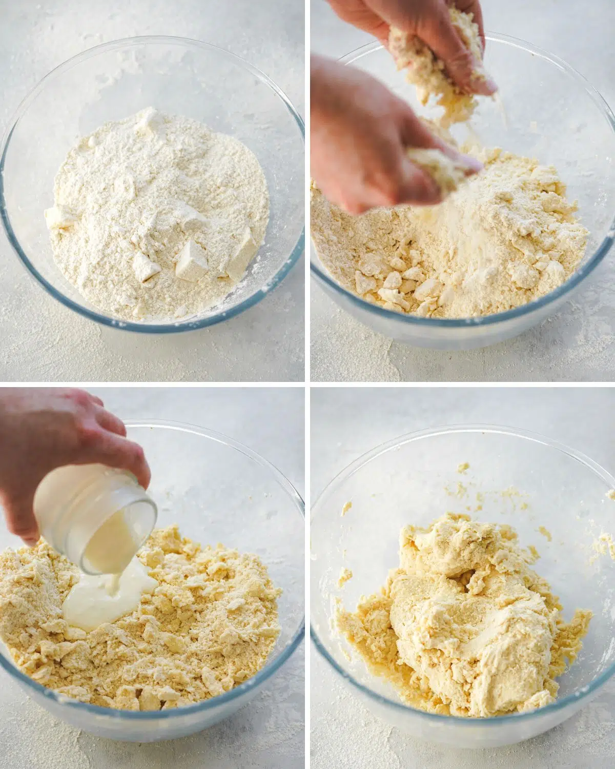 making pastry by rubbing the butter into the flour using hands.