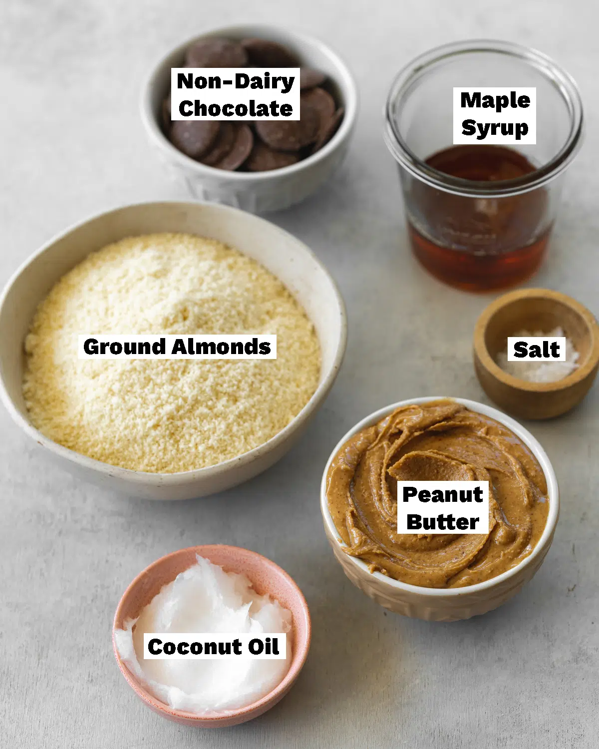 ingredients to make vegan twix bars measured out in bowls.