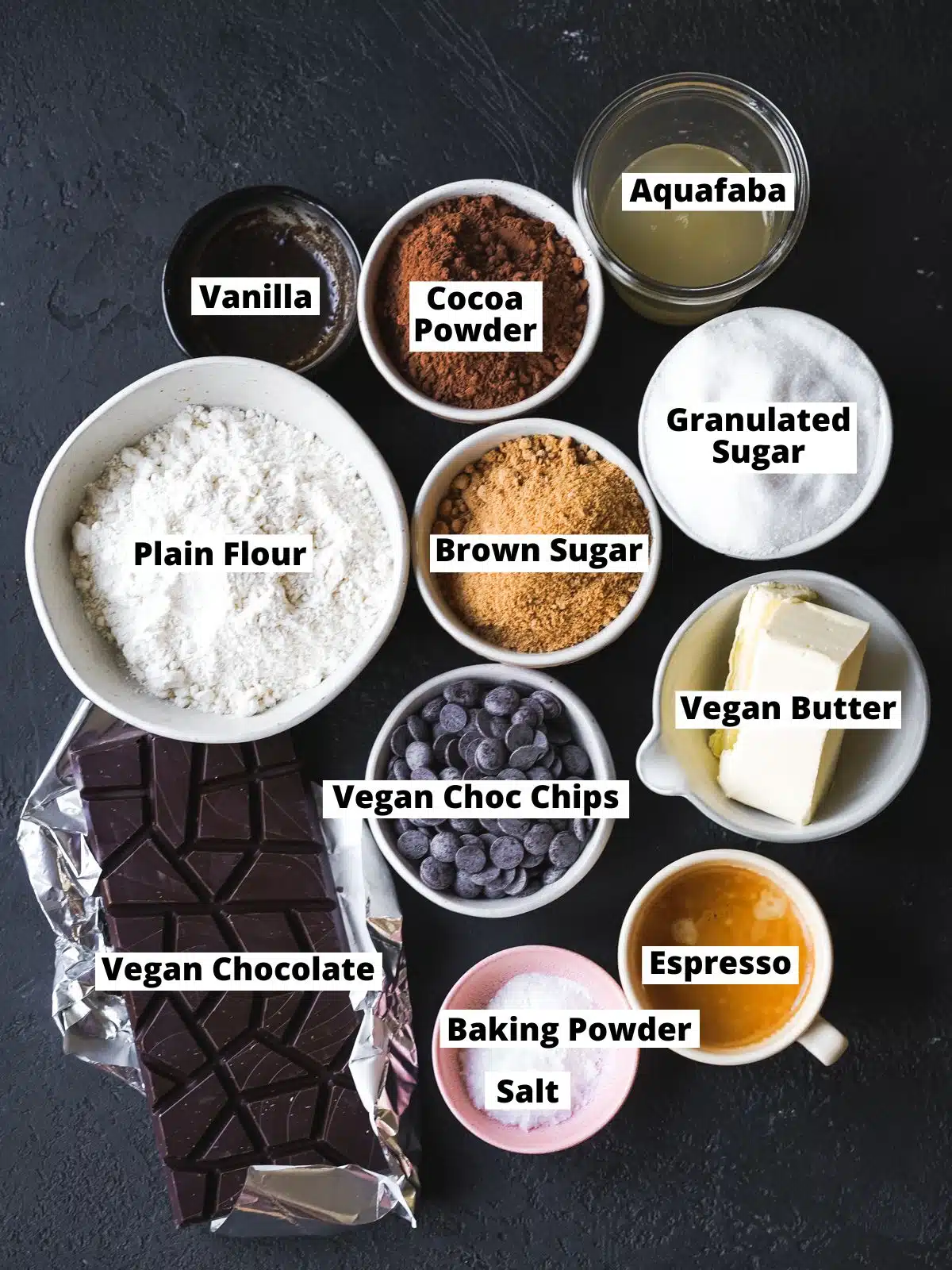 ingredients to make eggless brownies measured out in bowls.