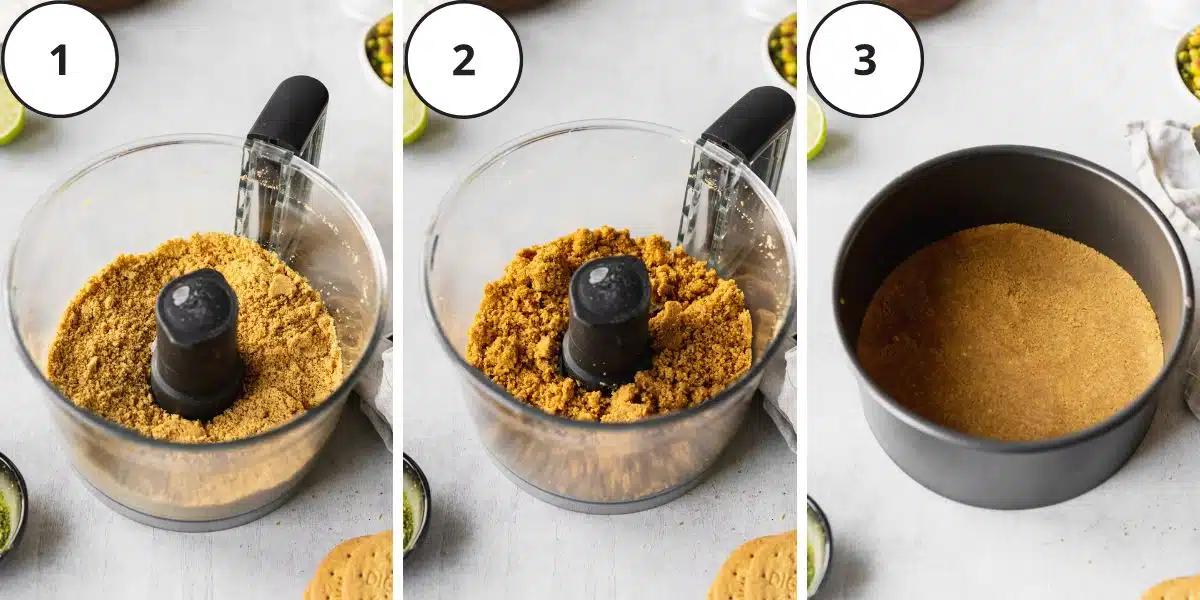 a food processor with cookie crumbs ground up inside.