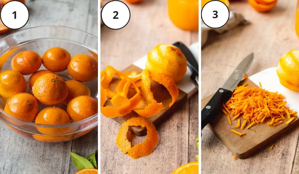 oranges in a bowl of water and sliced orange peel on a wooden chopping board with a knife.