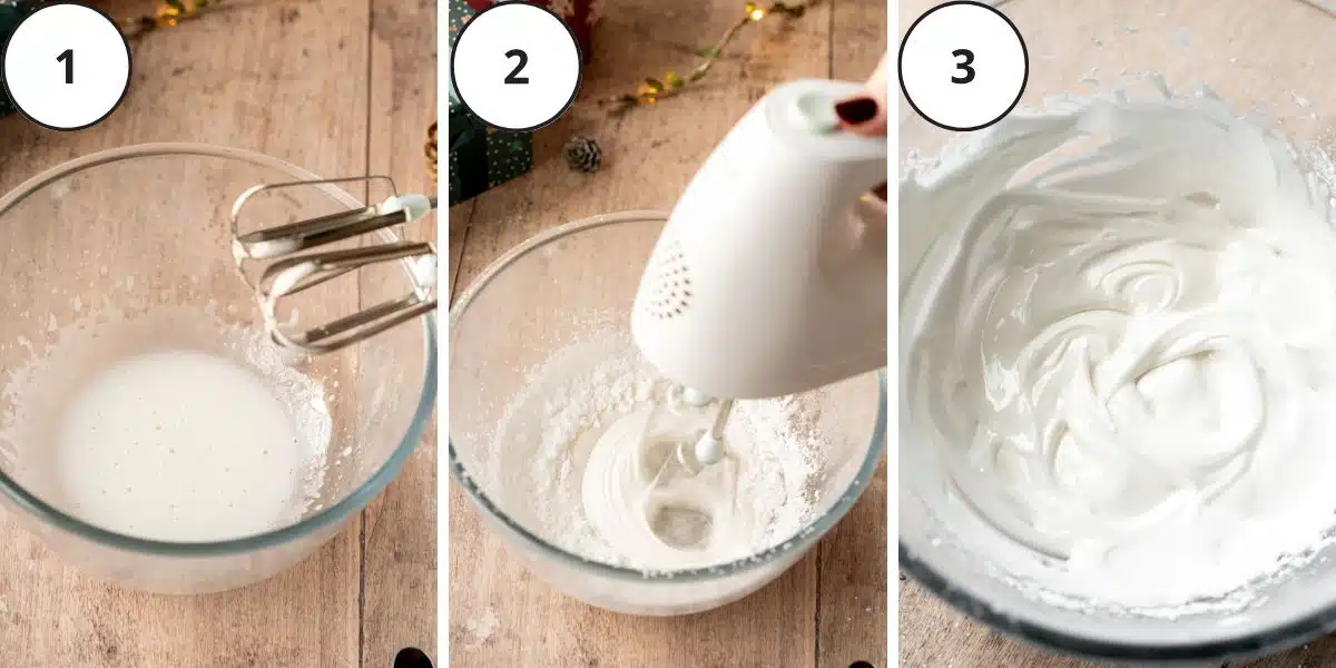 whisking royal icing in a mixing bowl with a hand whisk.