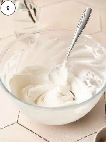 Vegan cream cheese icing after being whisked together in a bowl.