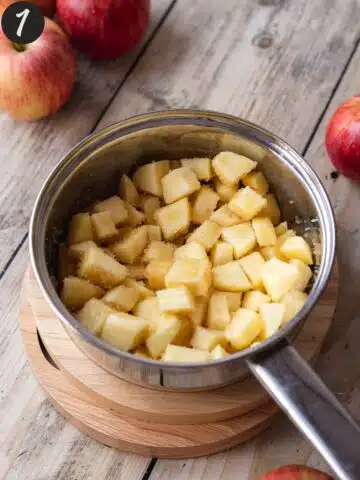 cubed apples, lemon, and brown sugar in a saucepan.