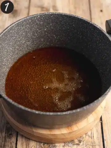 sugar and water in a saucepan caramelized using wet caramel method.