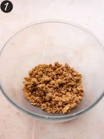 Cinnamon brown sugar streusel topping mixture in a mixing bowl.