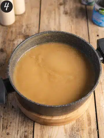 vegan flan custard in a saucepan after thickening on the hob.