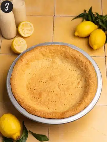 blind baked pie crust cooling before adding lemon curd filling.