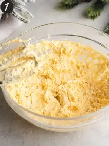 butter, sugar, and vanilla whisked until light and airy in a large mixing bowl.