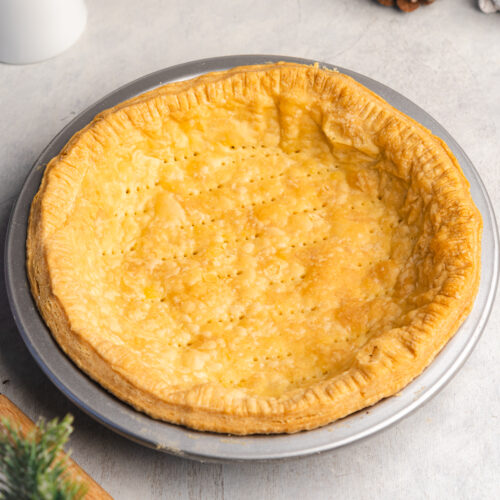 a perfectly baked flaky pie crust ready for filling.