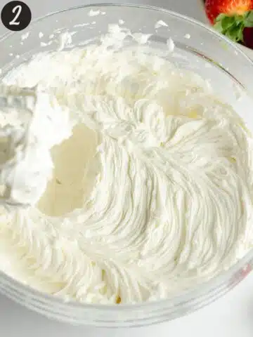 whipped coconut cream and vegan cream cheese in a large mixing bowl.