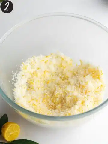 sugar with lemon zest rubbed into it in a large mixing bowl.