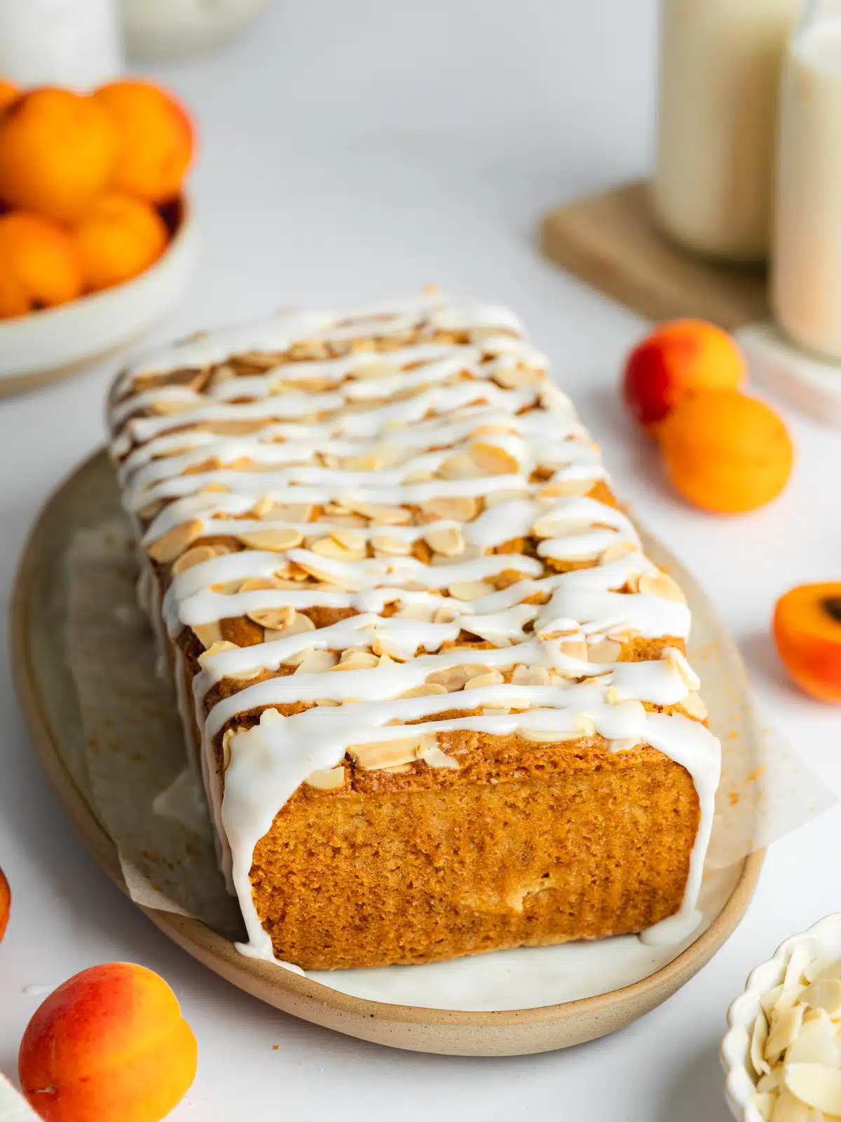apricot cake with sugar glaze drizzle over the top.