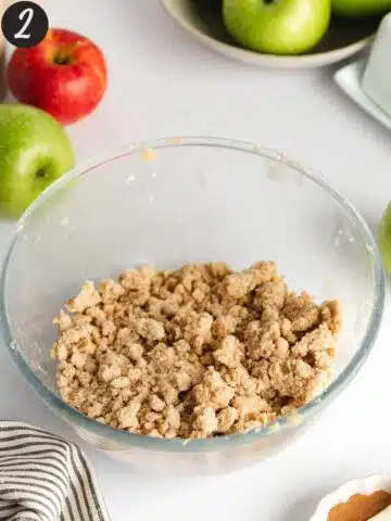 apple crumble topping in a mixing bowl.