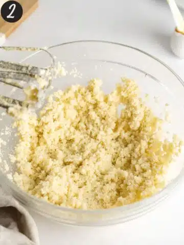 butter and sugar creamed together in a mixing bowl.