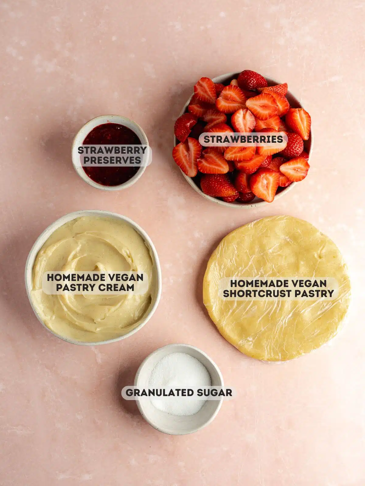 ingredients to make vegan strawberry tart measured out in bowls.